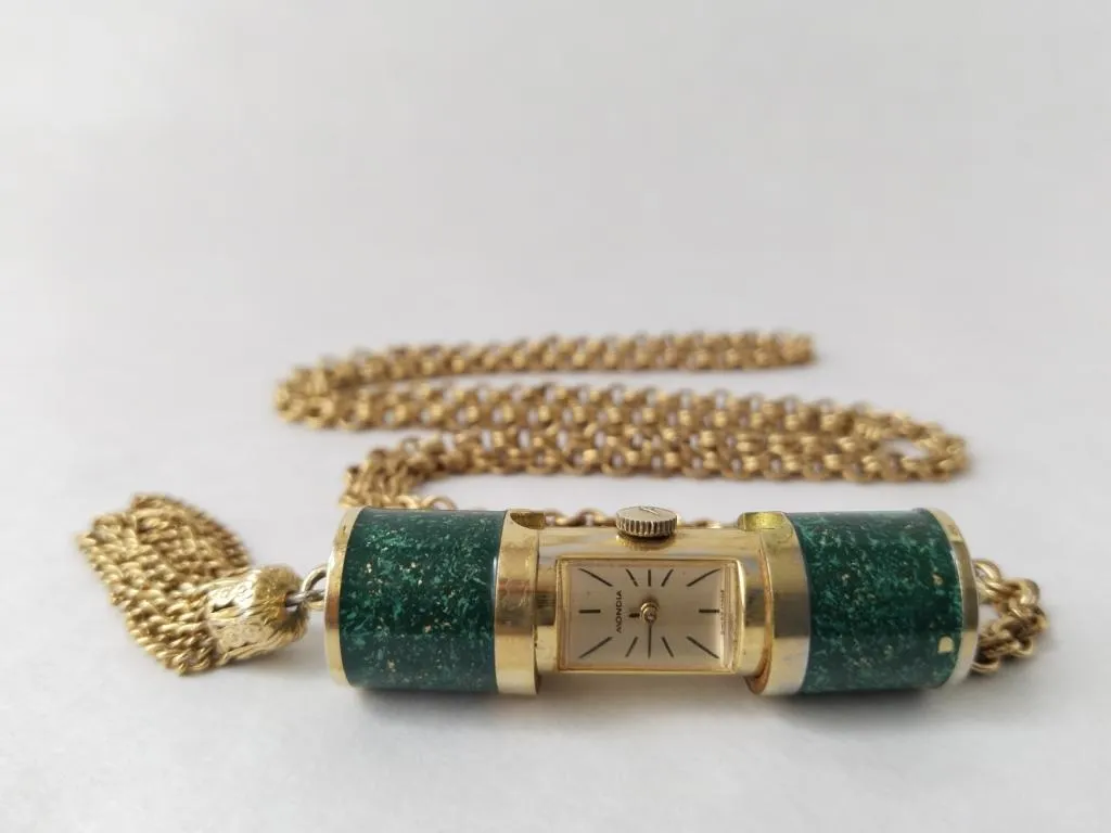 1960s Mondia Swiss-made vintage pendant watch: A timeless piece blending jewelry and functionality with its elegant enamel and gold design.