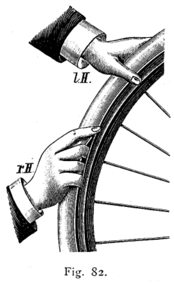 The second illustration of the step-by-step guide showing how to properly remove a Continental-Pneumatic tire for maintenance.