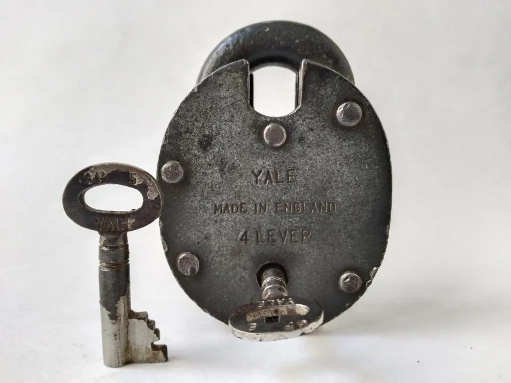 An antique Yale padlock made in England, complete with two original keys.