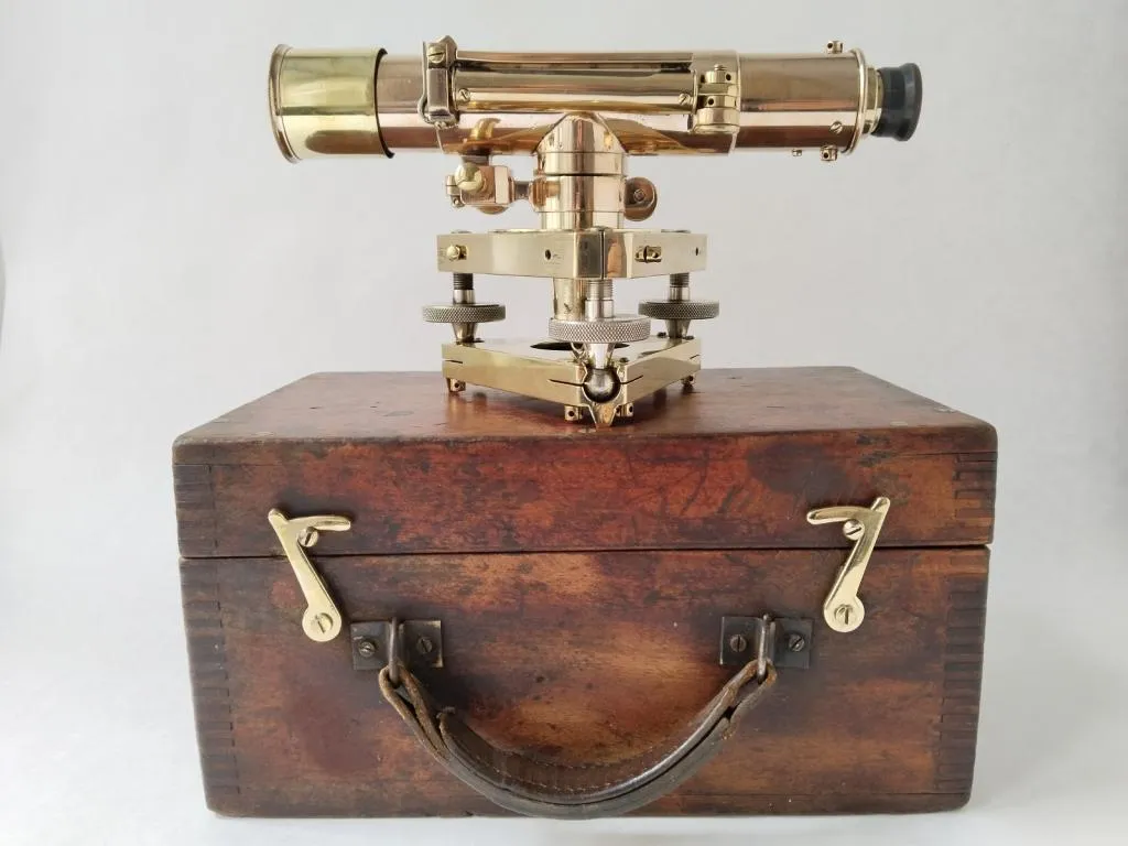 A 1920s brass theodolite by Stanley of London, originally crafted for the Ministry of Agriculture and Fisheries, in its original mahogany case.