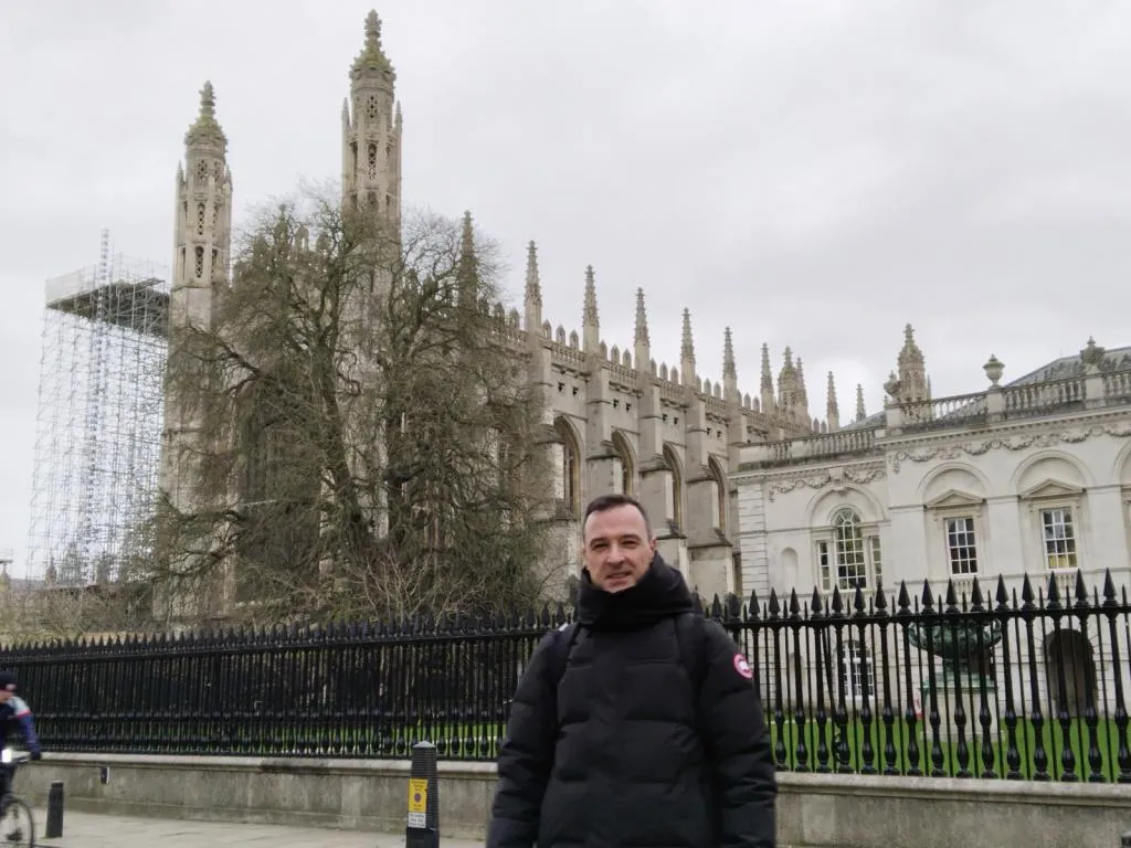 Standing in front of the iconic King's College Chapel at Cambridge University, capturing a memorable moment during my antique hunting trip.