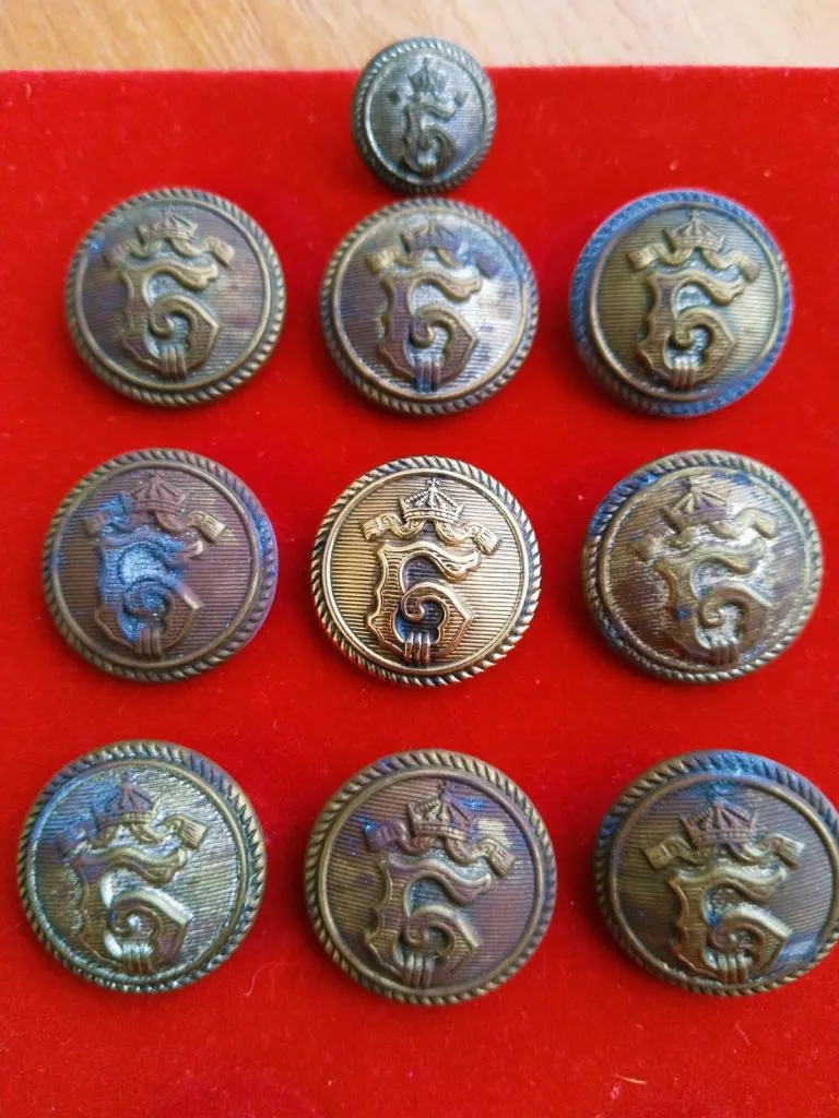 A set of 10 ceremonial royal military buttons from the Boris III Kingdom of Bulgaria, featuring the Tsar's monogram and intricate detailing.