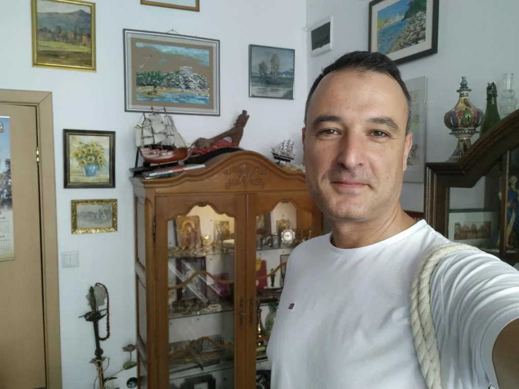 Inside the Karesa Antiques Shop in Varna, surrounded by its unique collection of antiques and historical treasures.