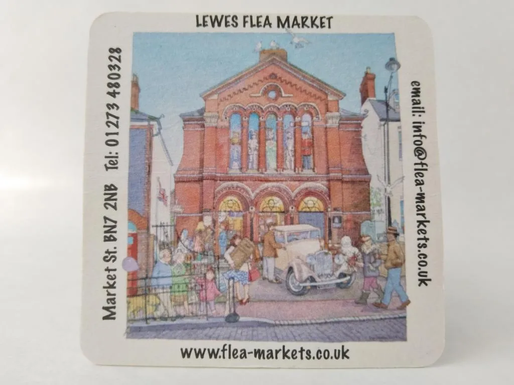 A charmingly illustrated coaster depicting the historic building of Lewes Flea Market, located on Market Street.