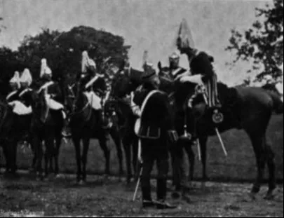 The dragoon borderer Major Romanes of The King's Own Scotish Borderers speaking to an officer of The Berwickshire Yeomanry.