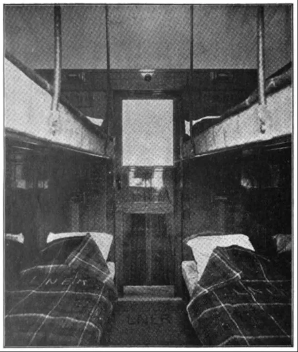 Interior view of the sleeping car, showing the compact but well-arranged sleeping berths with blankets labeled LNER.